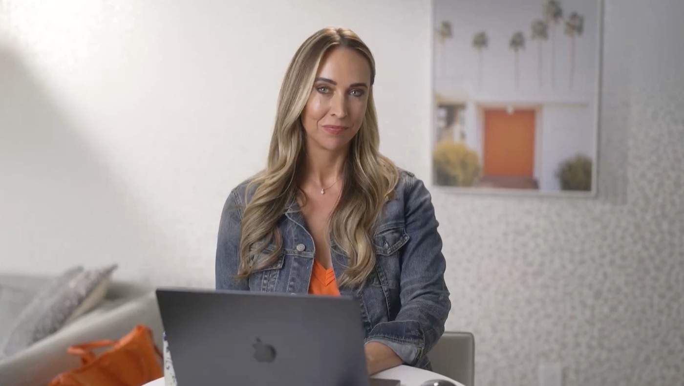 Jam at her laptop, ready to help you pick your marketing