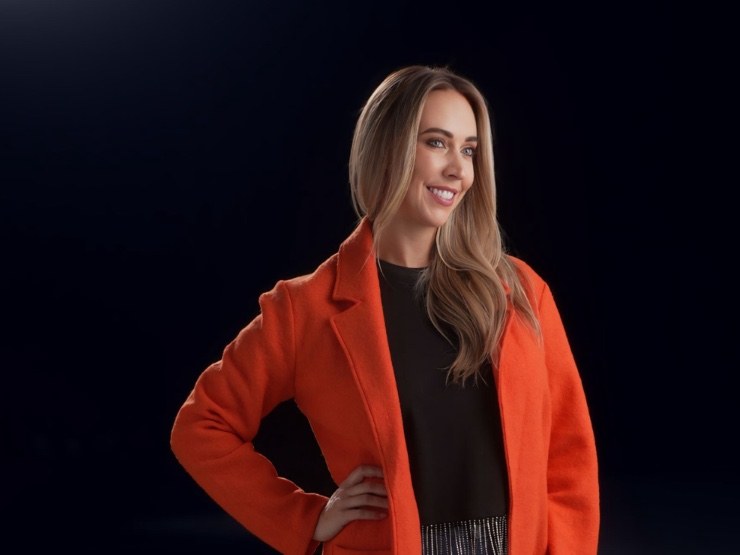 Jam in her signature orange coat